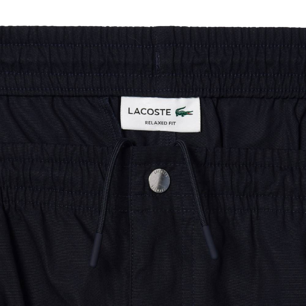 LACOSTE PANTALONI CORTI RELAXED FIT ELASTICIZZATI IN POPELINE DI COTONE GH7220HDE SKU: GH7220HDE Qualità