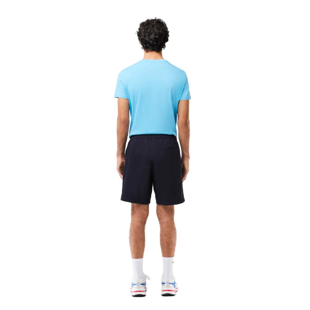 LACOSTE PANTALONI CORTI RELAXED FIT ELASTICIZZATI IN POPELINE DI COTONE GH7220HDE SKU: GH7220HDE Qualità