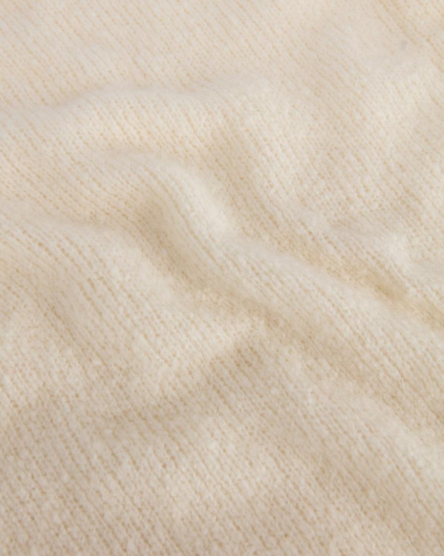 Scaglione ROUND NECK SLIM PUFFED CASHMERE SEAMLESS MILK Rilascio limitato