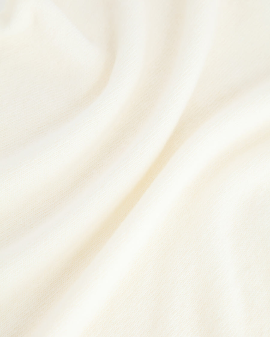 Scaglione TURTLE NECK SLIM RAGLAN SEAMLESS MILK Smaltimento dello stoccaggio